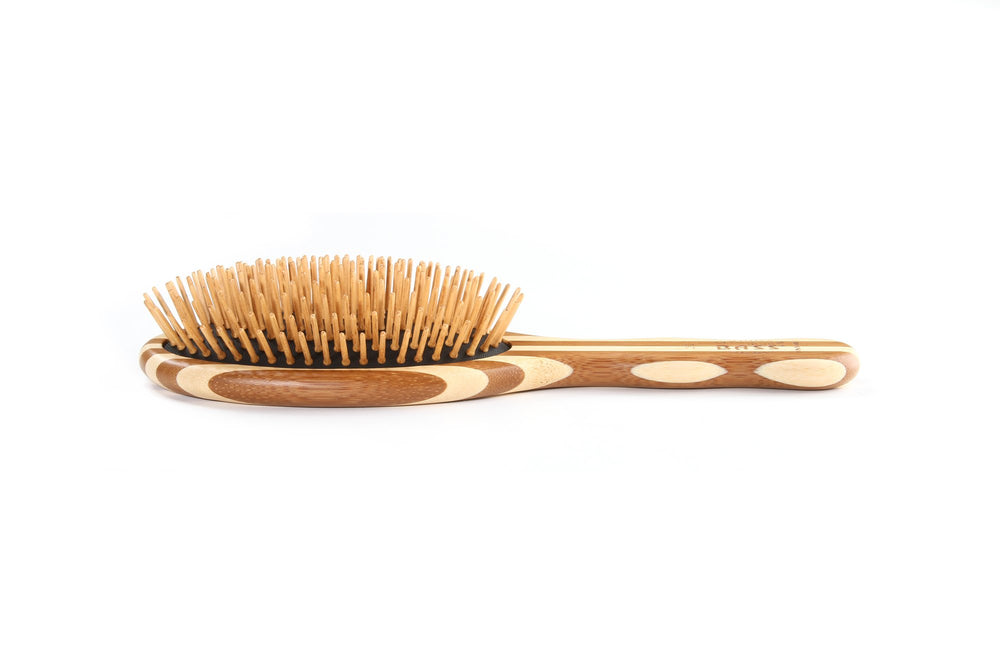 Bass Green Brush bamboo handle detail highlights vegan design and premium finish.