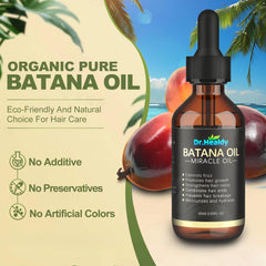 Batana Oil on hair application close-up illustrating conditioning and frizz reduction.