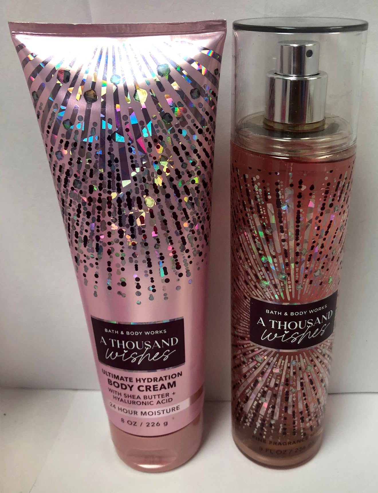Bath & Body Works A Thousand Wishes Fine Fragrance Mist bottle with pink prosecco notes for mood lift.