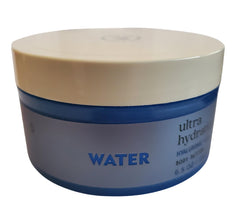 Bath & Body Works Body Butter bottle pour shows long-lasting moisture.