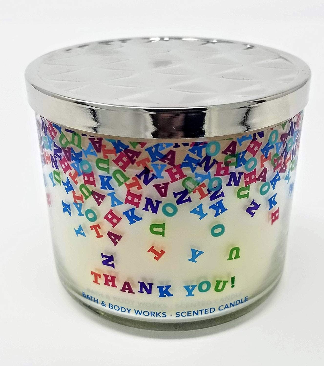 Bath & Body Works Champagne Toast candle jar artwork showcases seasonal color variations