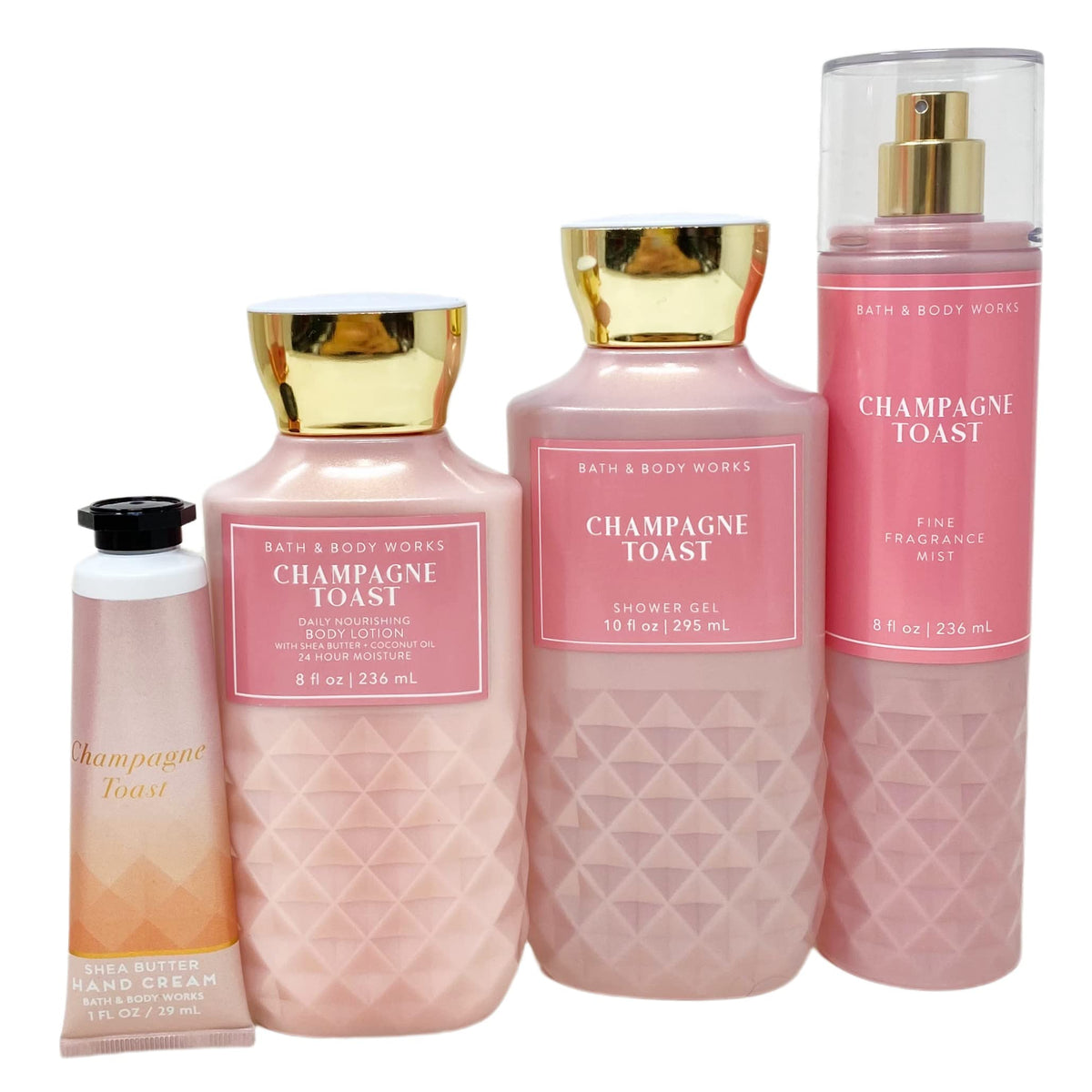 Bath & Body Works Champagne Toast gift bag arrangement featuring lotion, gel, mist for indulgent pampering.