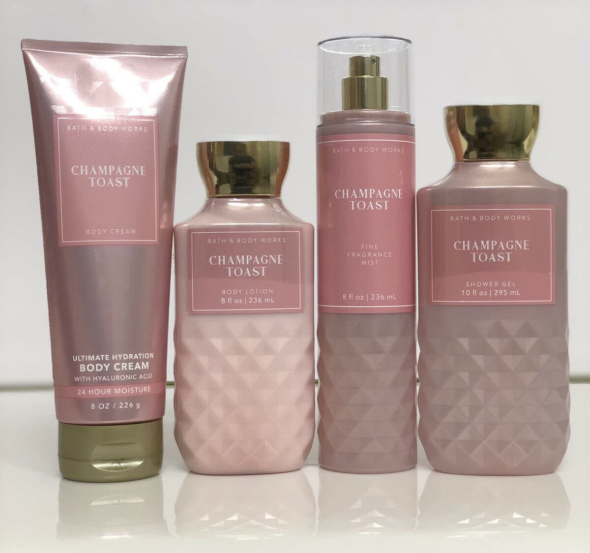 Bath & Body Works Champagne Toast shower gel pump showcases cleansing bubbles with fruity vanilla notes.