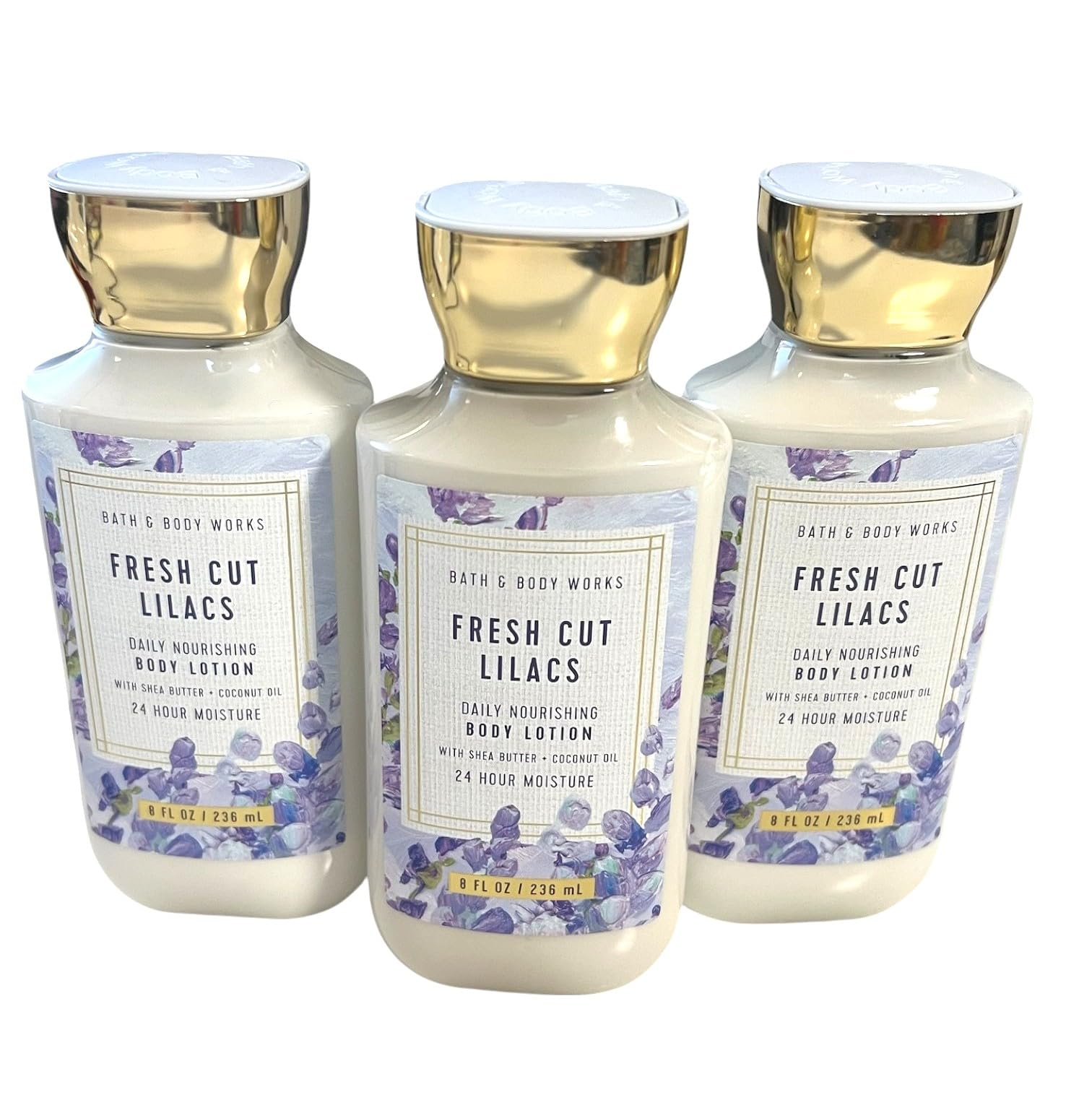Bath and Body Works Fresh Cut Lilacs 3 Pack bottles closeup for daily moisturizing.
