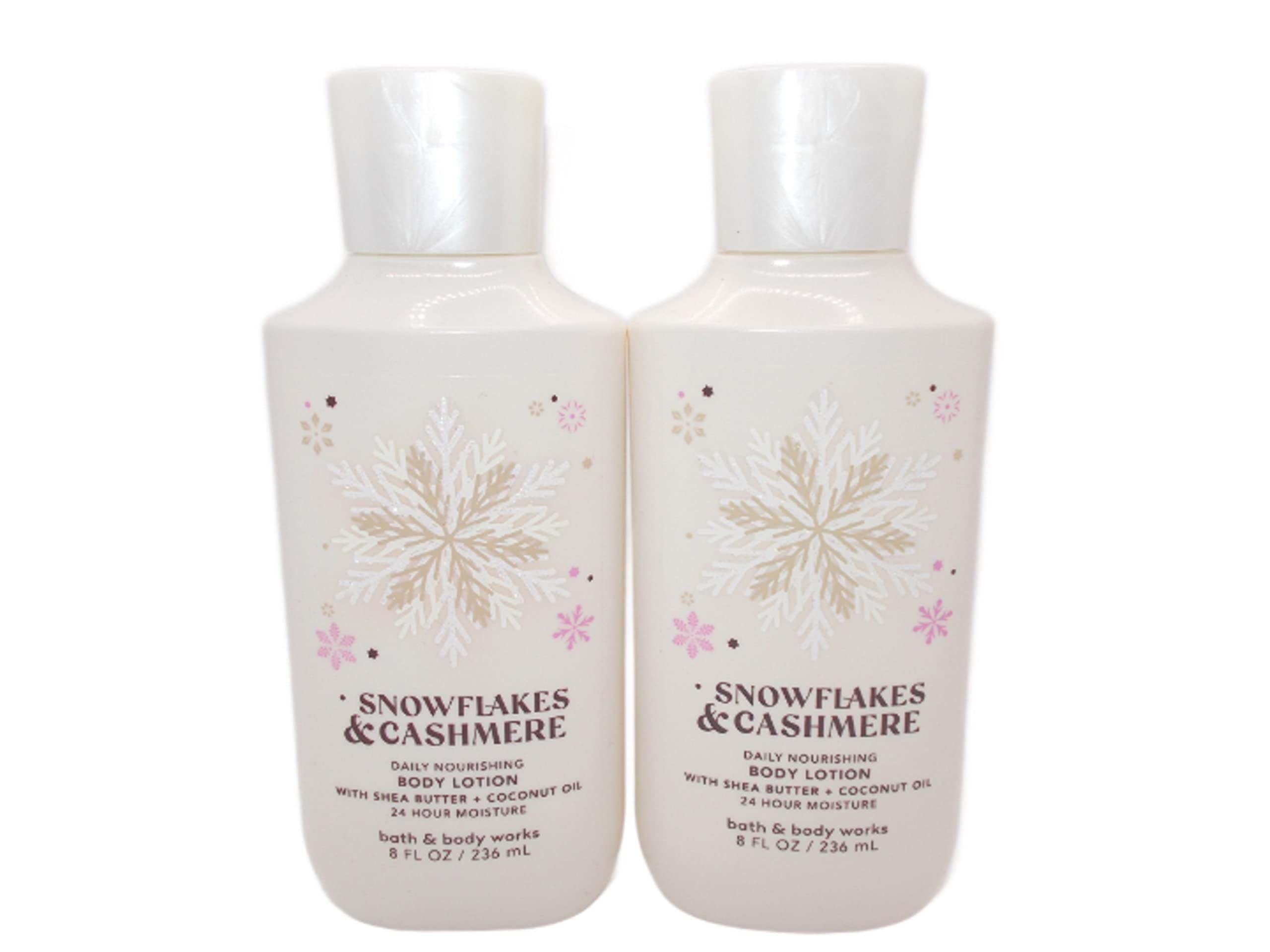 Bath & Body Works Snowflakes & Cashmere 8oz bottle pouring for lasting moisture.