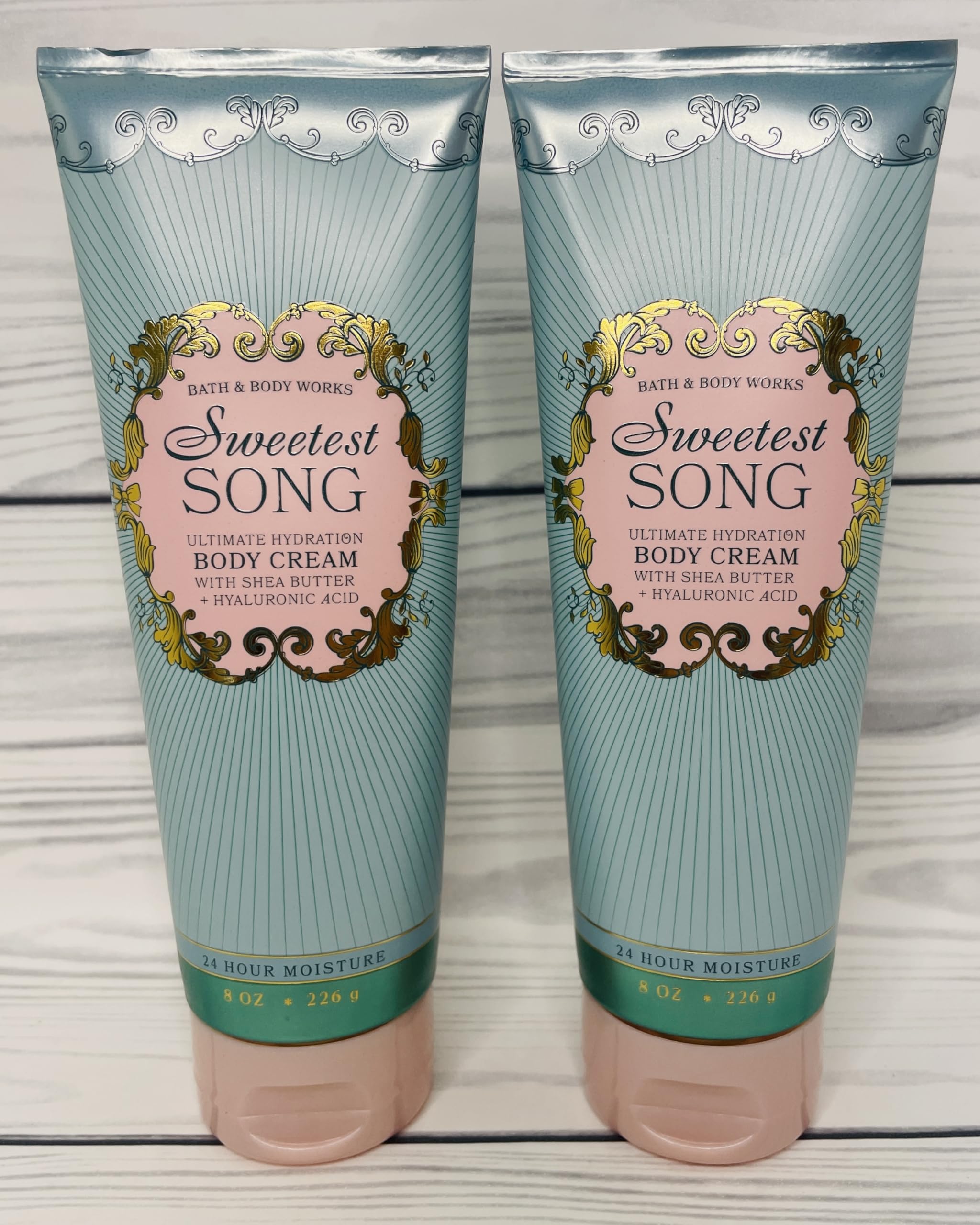 Bath & Body Works Sweetest Song body cream tub closeup highlighting creamy texture for smooth skin.