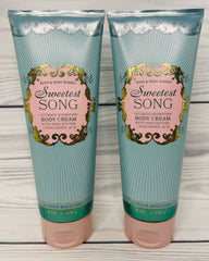 Bath & Body Works Sweetest Song body cream tub closeup highlighting creamy texture for smooth skin.