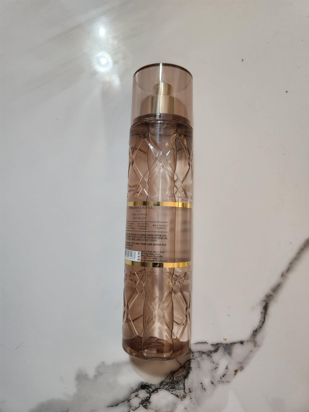 Bath & Body Works If You Musk mist being applied demonstrates lightweight, portable fragrance.