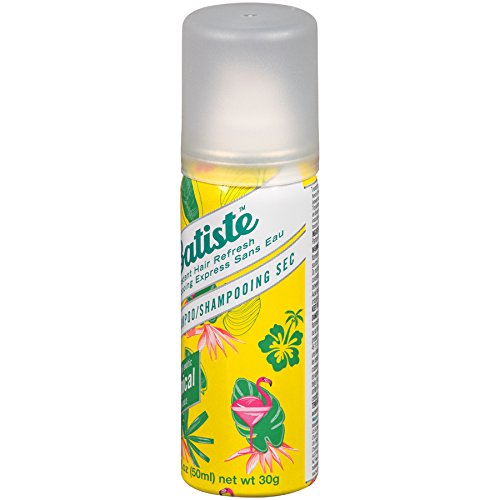 Batiste Tropical dry shampoo travel-friendly pack in hand; everyday freshness.