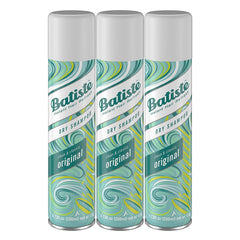 Batiste Original Dry Shampoo bottle pours to refresh roots between washes.