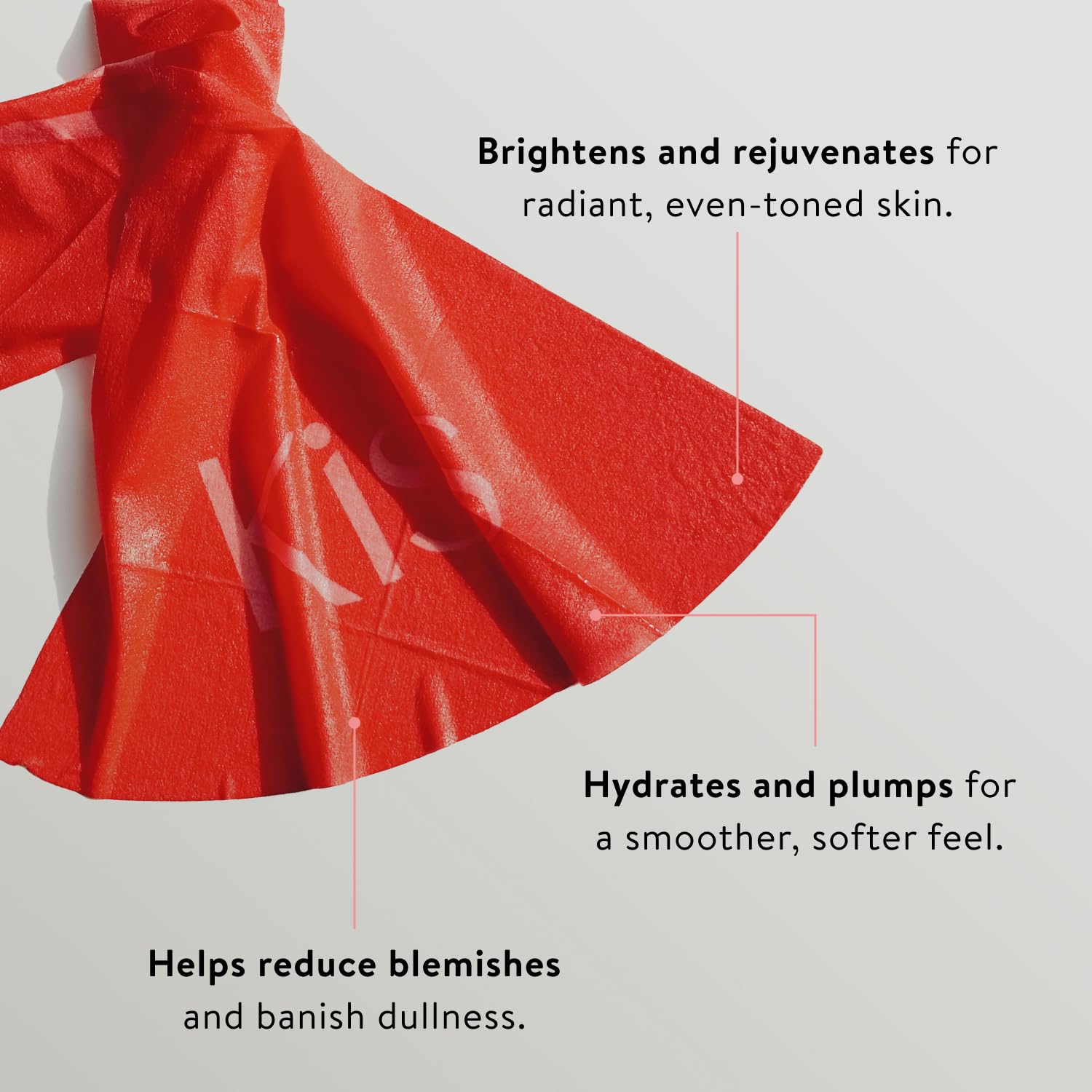 Applying BAWDY Kiss It on cheeks for citrus brightening and radiance.