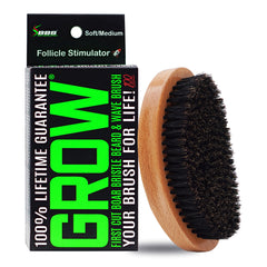 BBS Grow Beard Brush in hand for even oil distribution and grooming.
