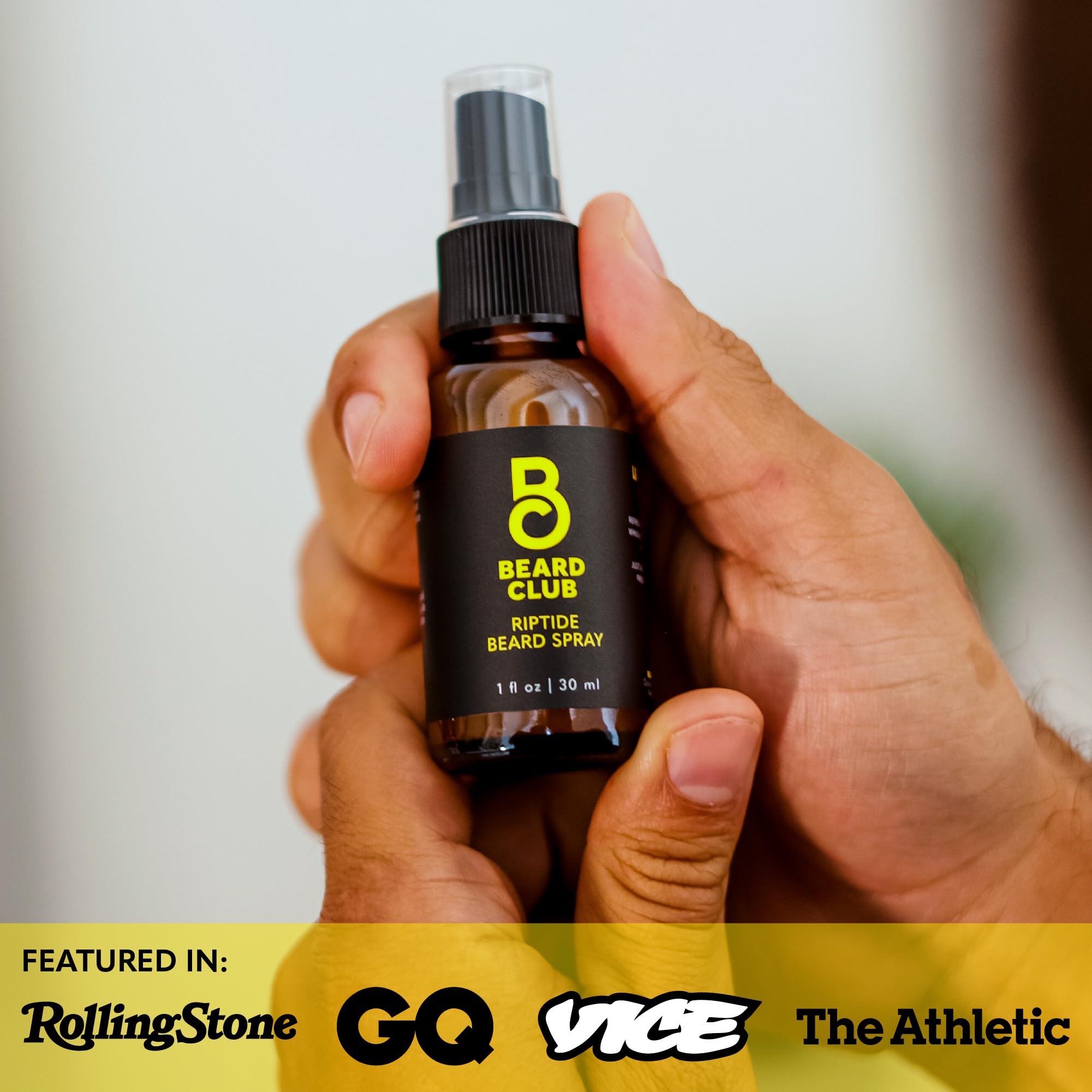 Frontal view of Beard Club Riptide bottle on a bathroom shelf