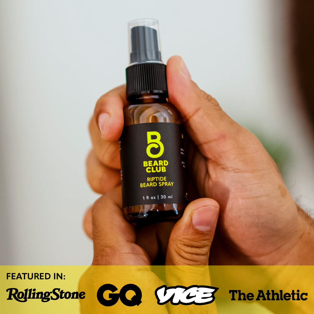 Frontal view of Beard Club Riptide bottle on a bathroom shelf