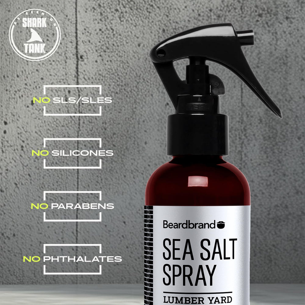 Beardbrand Sea Salt Spray Lumber Yard scent closeup highlights warm cedarwood notes.