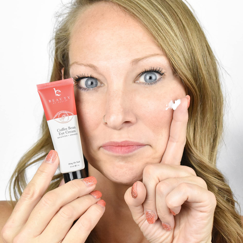 Beauty by Earth caffeine eye cream precise-dispense tip demonstrates controlled application