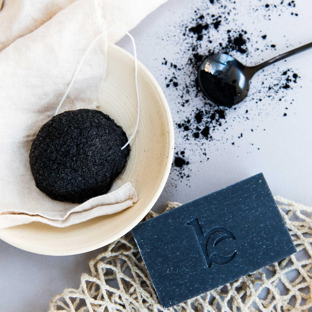 Beauty by Earth charcoal detail showcases natural detoxifying ingredient's texture