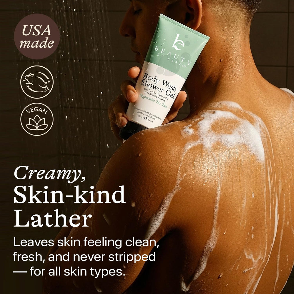 Beauty by Earth peppermint tea tree oil shower gel bottle on bathroom shelf in USA.