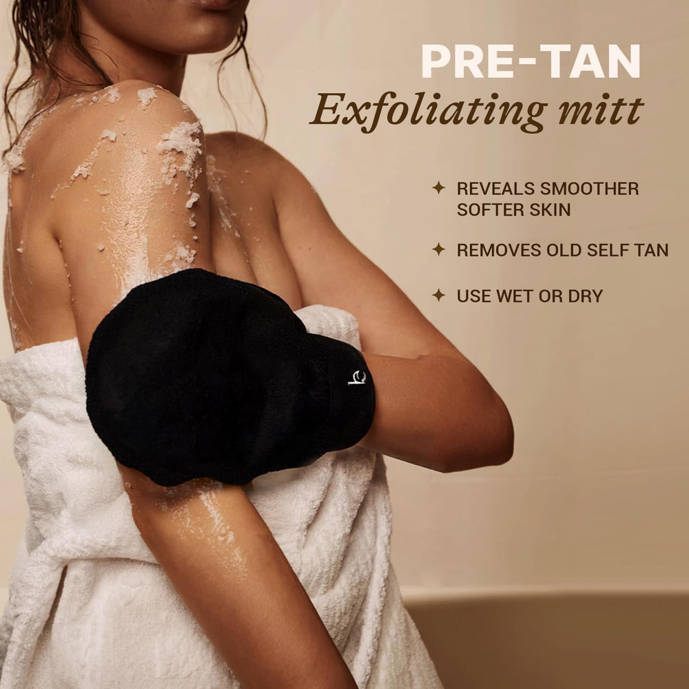 Beauty by Earth hands using mitts to apply self tan.