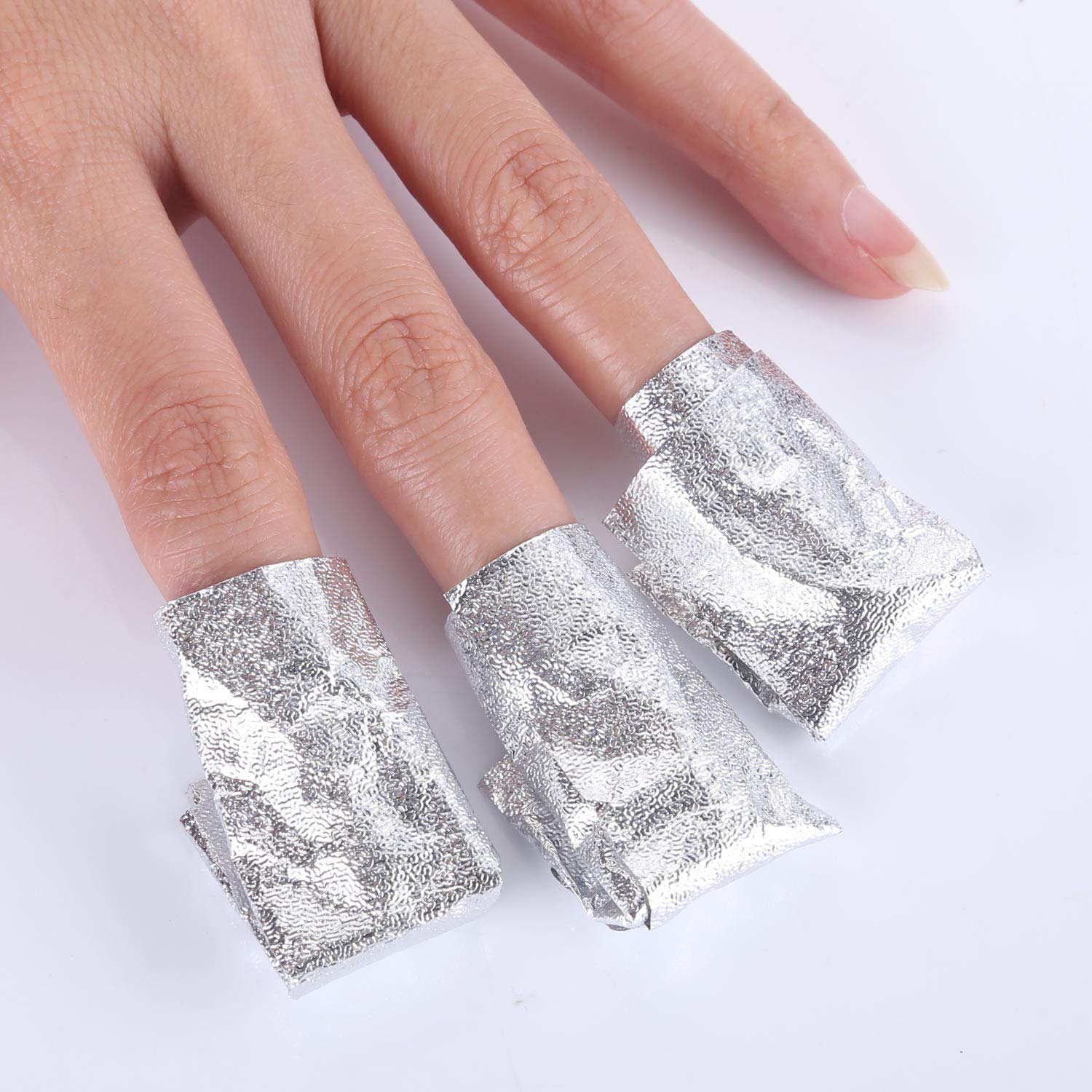 Beauty Max cotton pads inside wraps provide even acetone saturation for gentle removal.