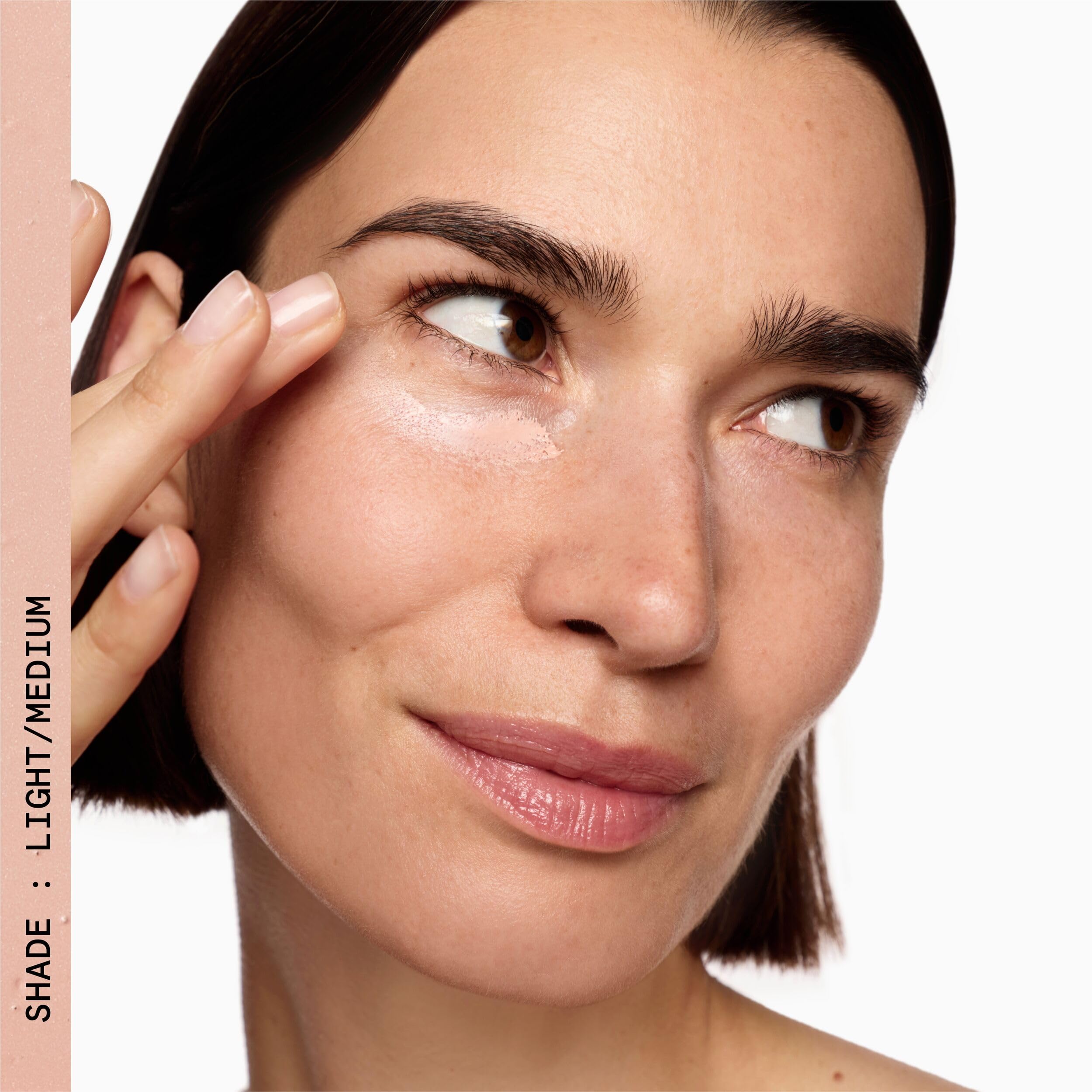 Beauty Pie Superluminous Under-Eye Genius Corrector in use demonstrates lightweight coverage