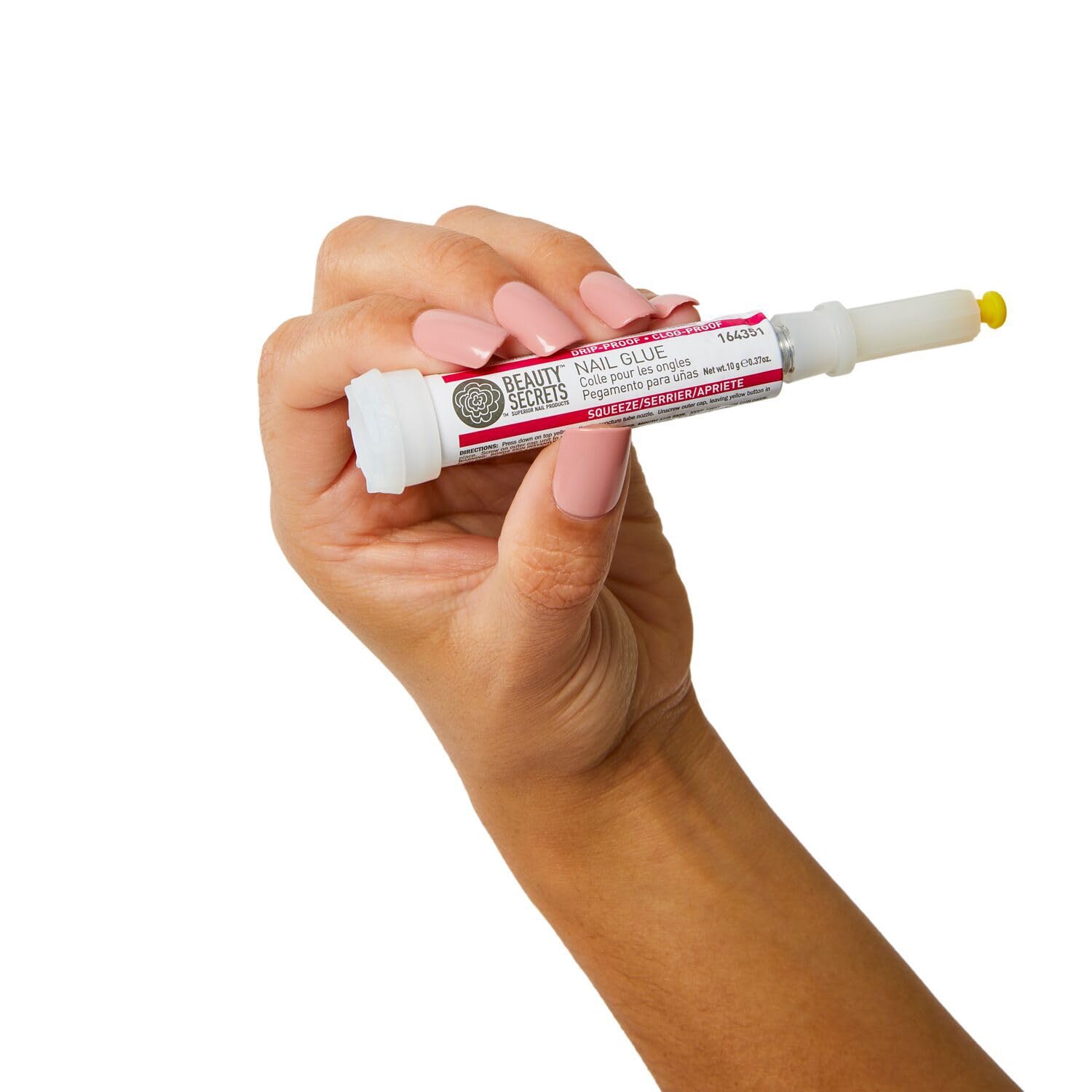 Beauty Secrets nail glue on nail demo shows secure wear through daily activities.