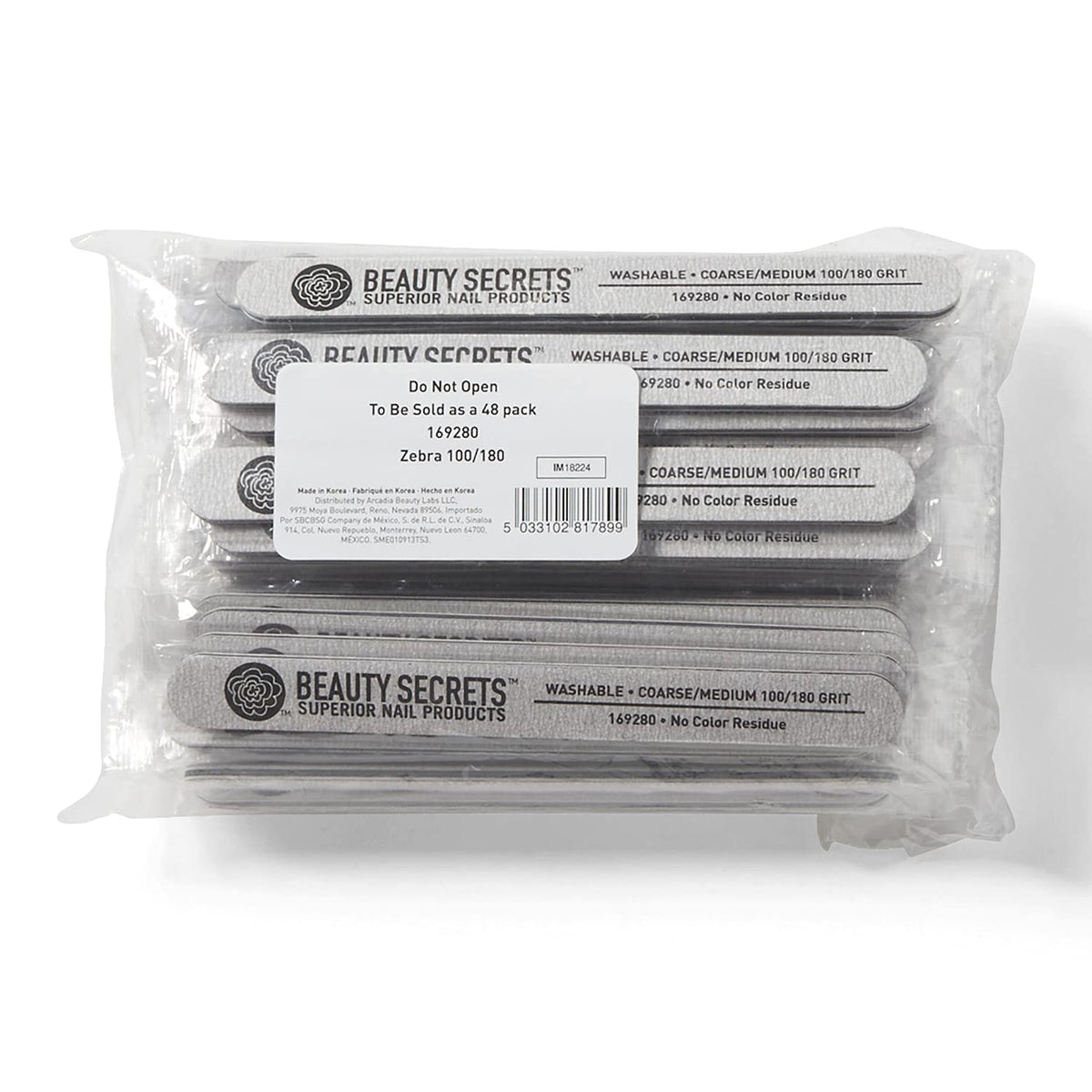 Beauty Secrets Zebra Cushion Nail File with 180/100 grit for acrylic nails and tips.