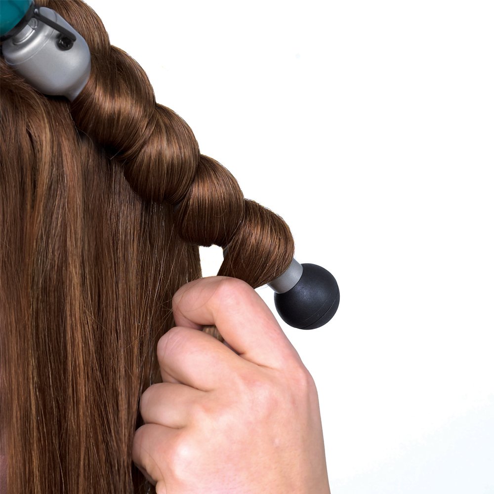 Bed Head Rock N Roller heat-protective glove supports safer styling.