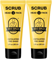 Bee Bald SCRUB bottle close-up showing exfoliating formula for shave prep.