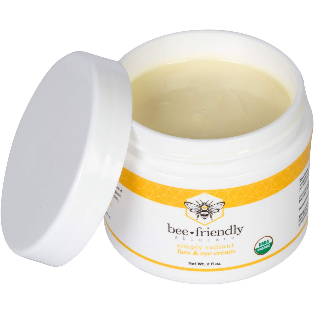 BeeFriendly Organic cream on hydrated skin shows subtle glow.