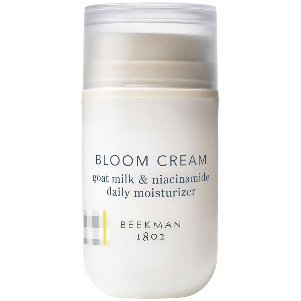 Beekman 1802 Bloom Cream tube closeup showcases a lightweight daily moisturizer for hydrated skin.