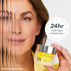 Beekman 1802 Milk RX Advanced Cream texture being spread on the skin in hand