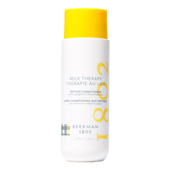 Beekman 1802 Milk Therapy Peptide Conditioner bottle pump close-up for smoother detangling.