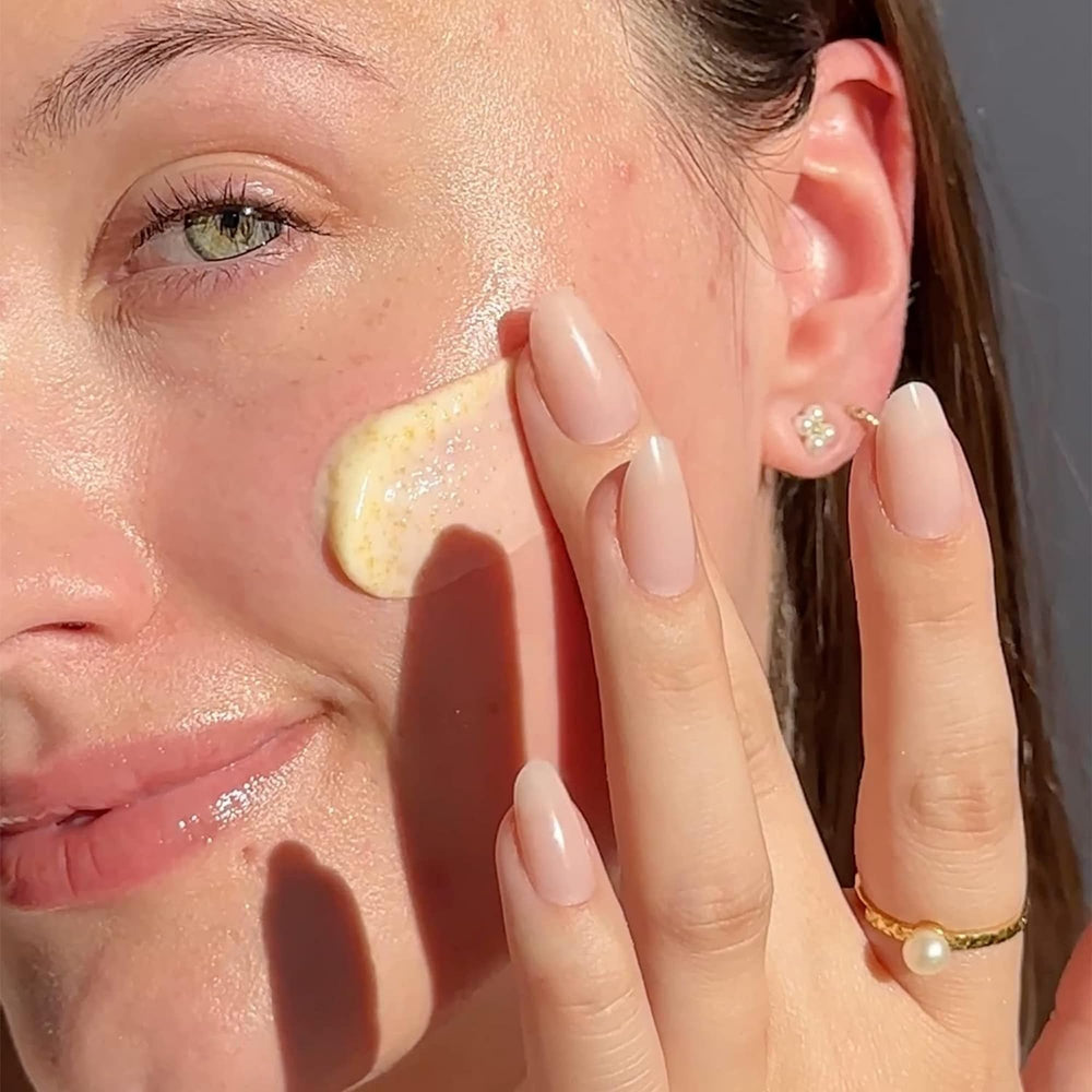 Beekman 1802 scrub in skincare routine shot shows simple, gentle cleansing for daily use.