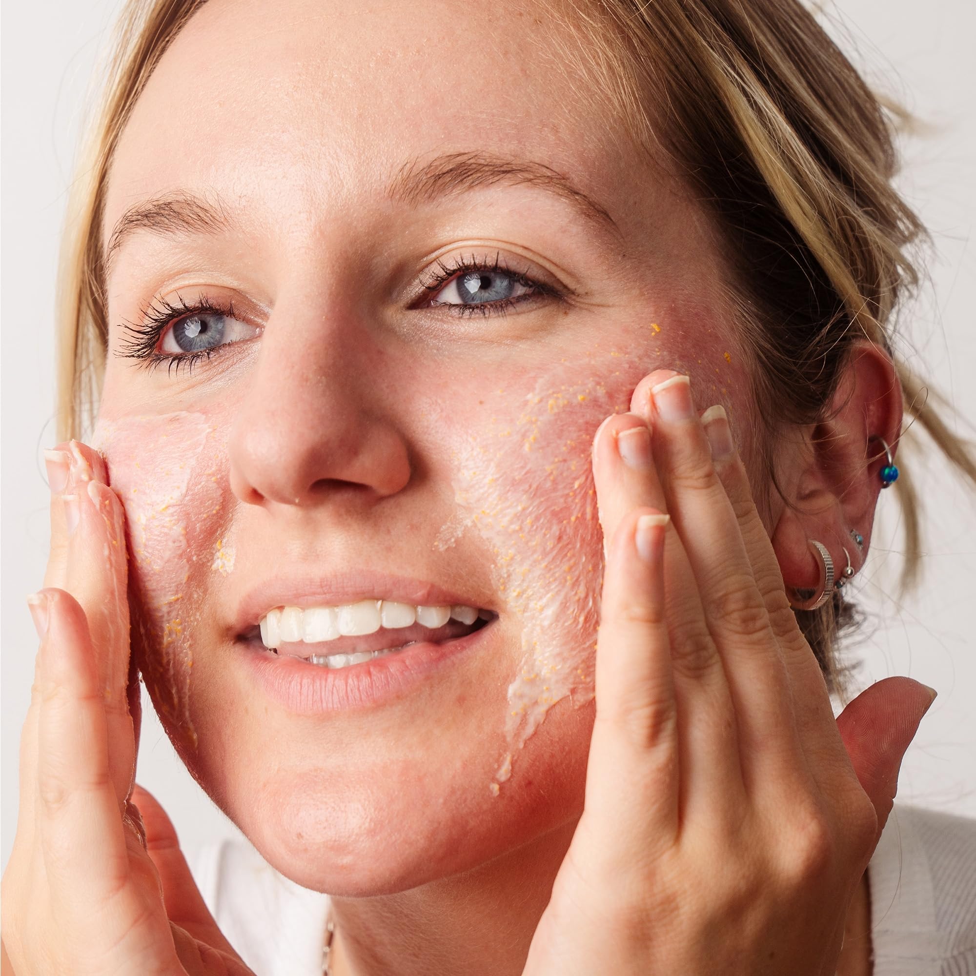 Beekman 1802 Oat Goat Milk Scrub jojoba beads close-up, gentle polish without micro-tears.