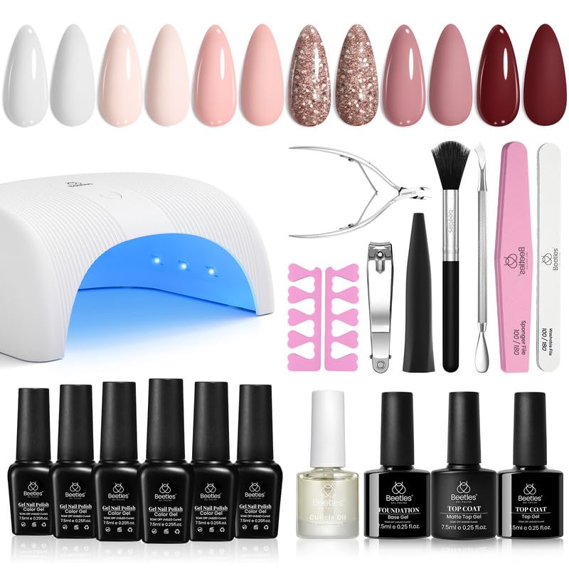 Beetles Gel Polish Kit UV lamp used for even at-home curing.