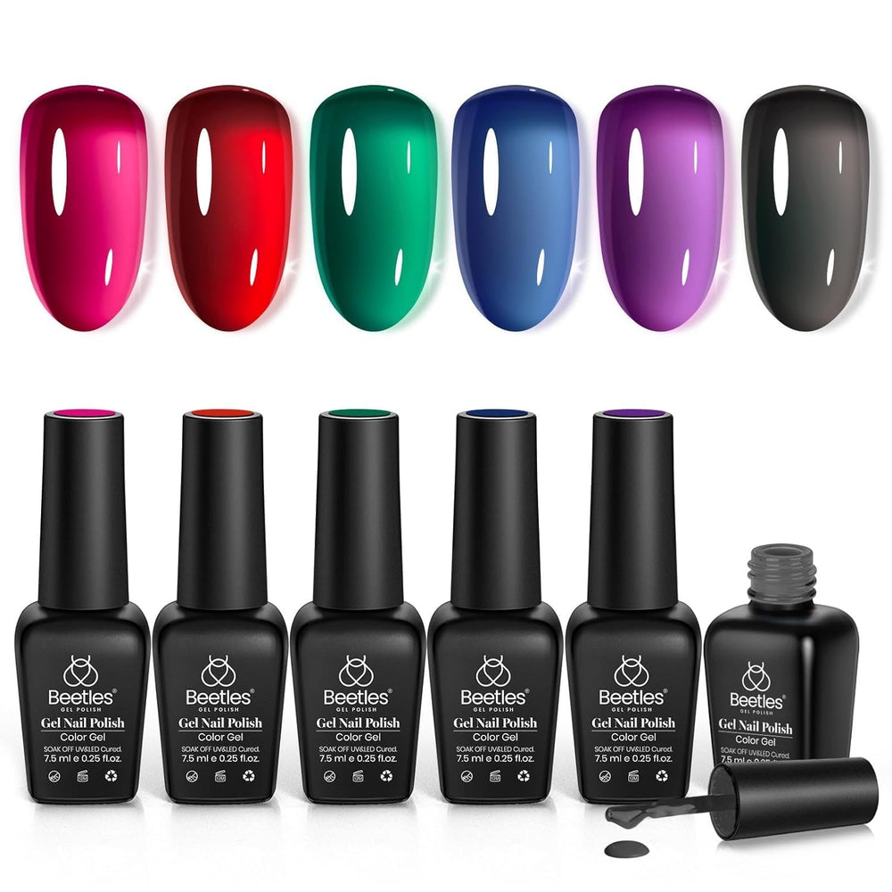 Beetles Vivid Noel blue bottle—festive jelly polish for subtle holiday nails.