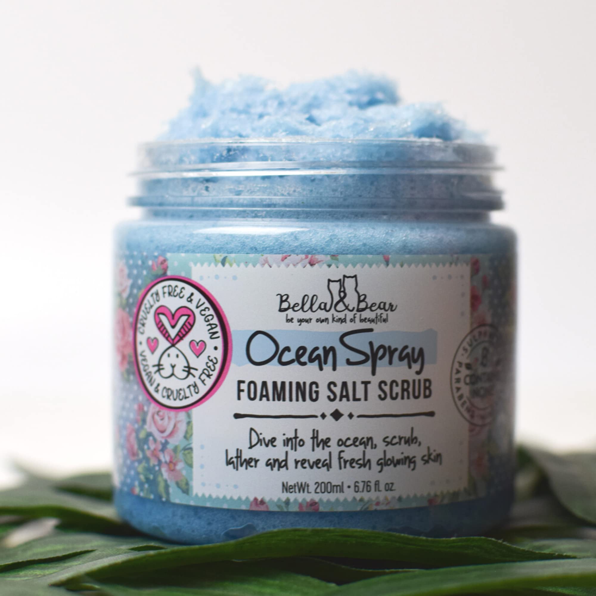 Bella & Bear Ocean Spray Scrub jar label highlighting vegan-friendly claim.