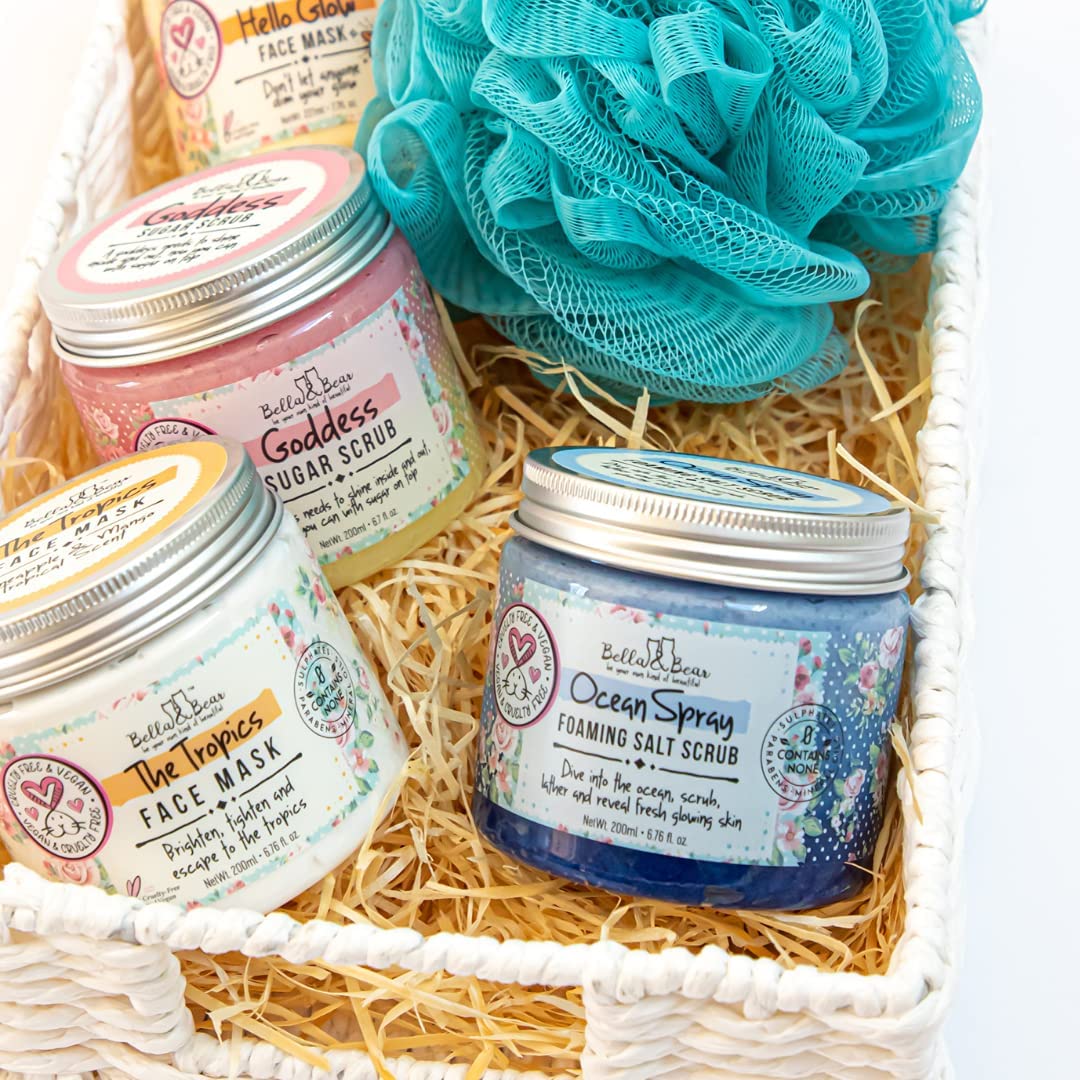 Bella & Bear Ocean Spray Scrub in hand during massage motion.
