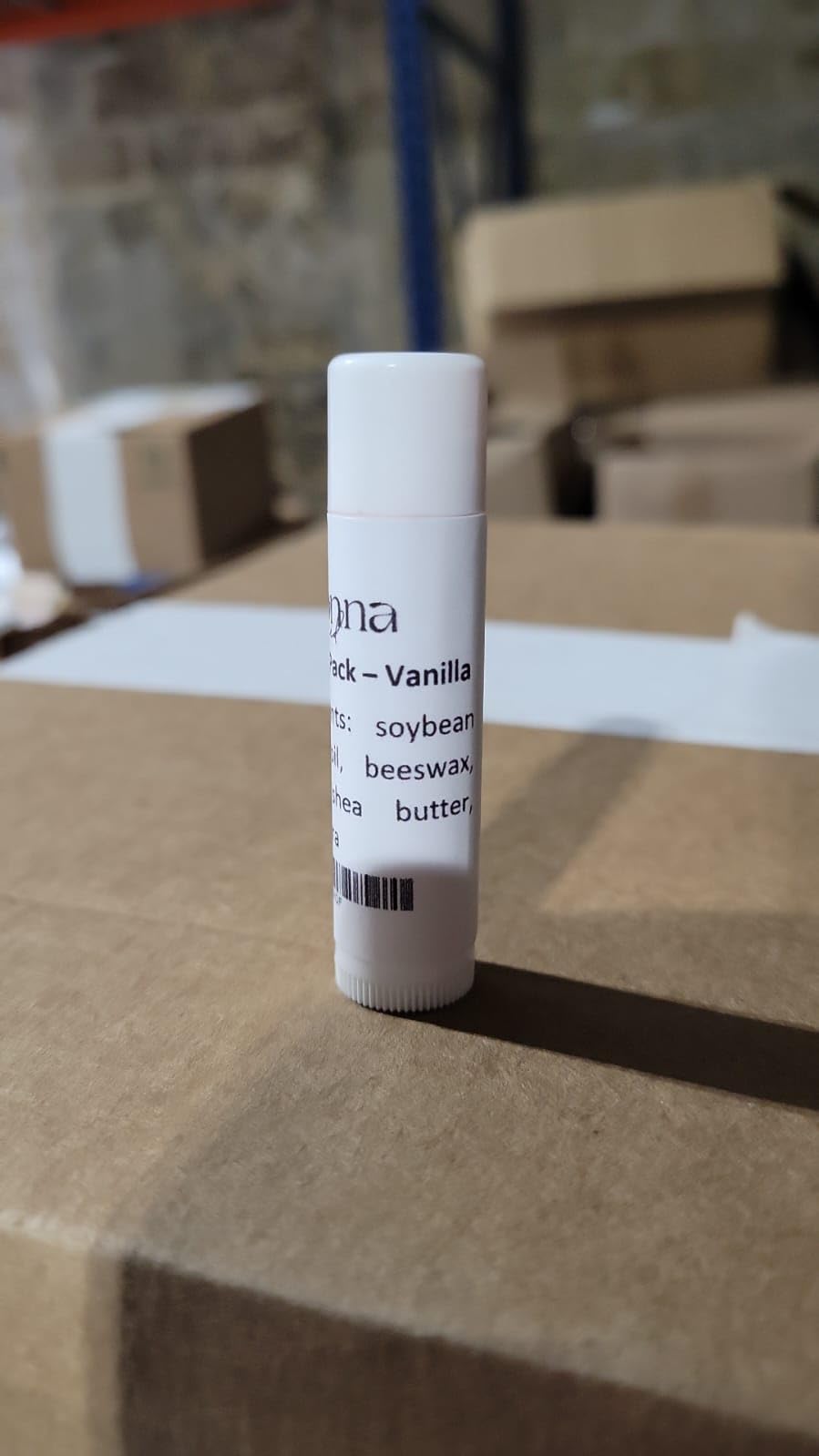 Belladonna Lip Balm Bulk vanilla tubes bulk display for events.