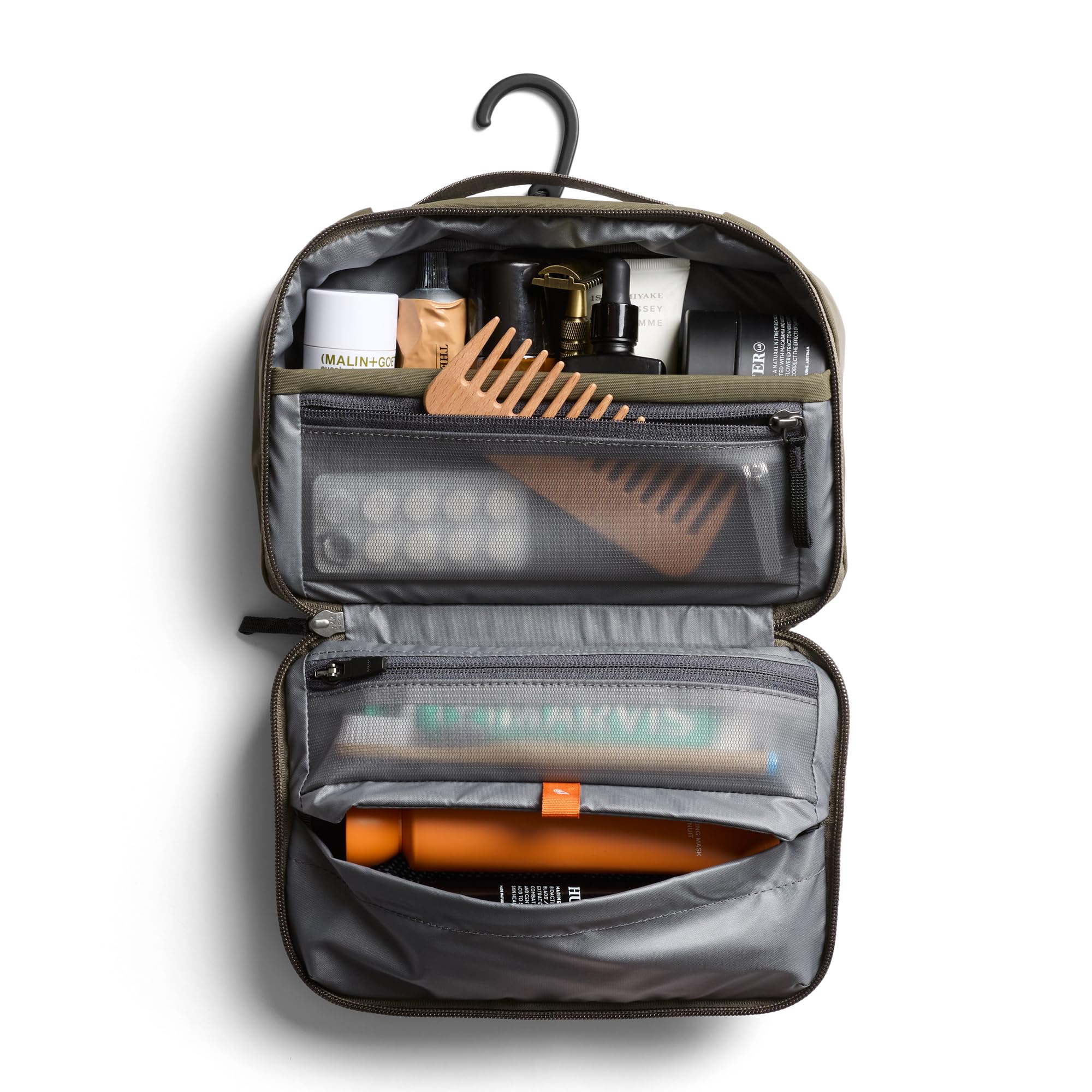 Bellroy Hanging Toiletry Kit toothbrush zip pocket keeps brushes secure.