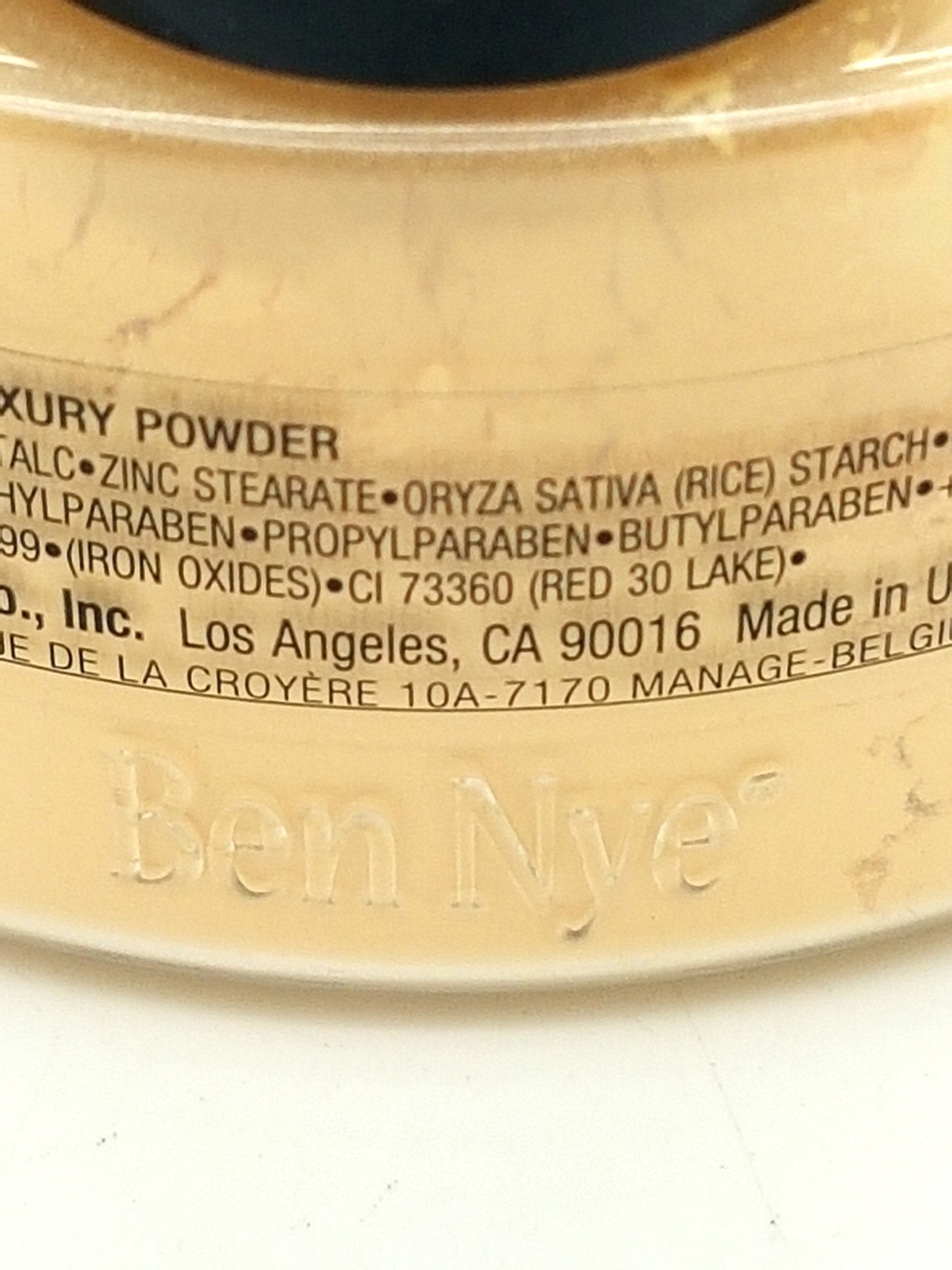 Ben Nye Banana application brush portrait showing lightweight application for flawless complexion