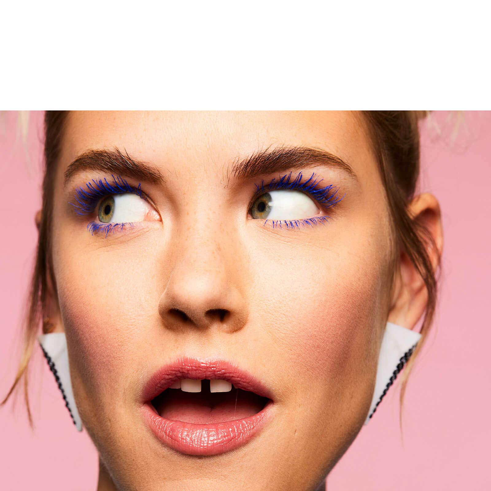Benefit BADgal BANG blue packaging on display signals bold, long-lasting wear.