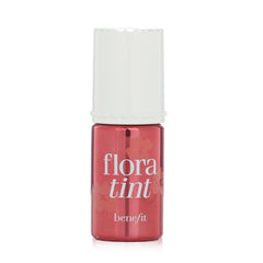 Benefit Benetint lip stain application shows long-lasting color for kiss-proof lips