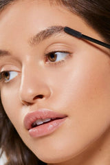Benefit Brow Setter applied to brows closeup demonstrating laminated lifting benefit