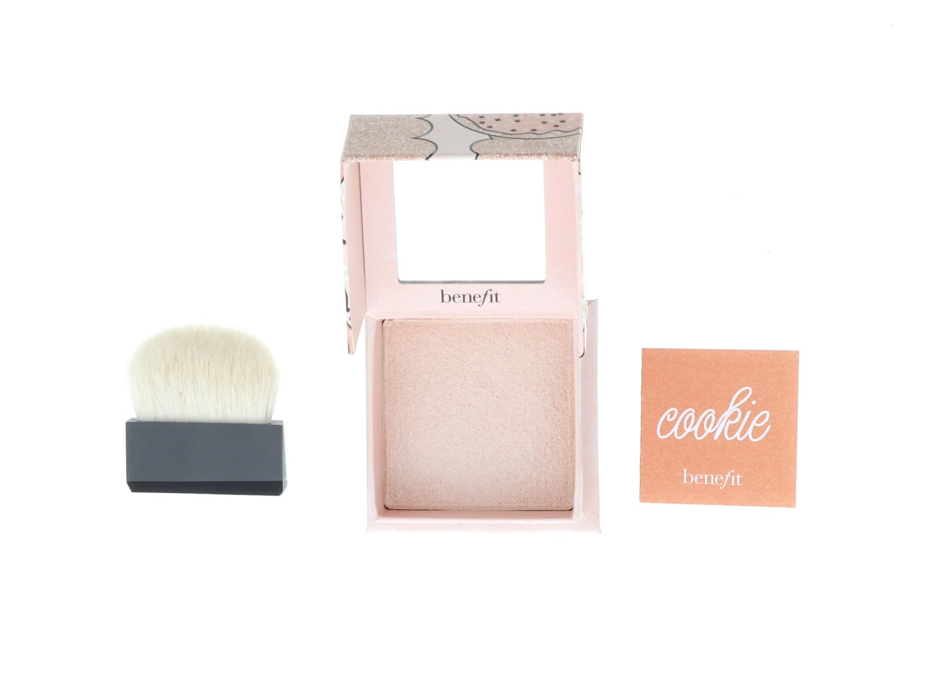 Benefit Cookie Powder Highlighter rounded blush brush for precise application.