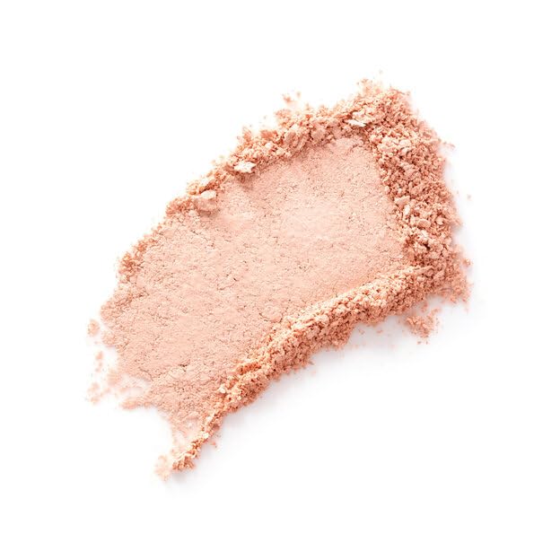 Benefit close-up of superfine powder texture highlighting blendable smooth finish