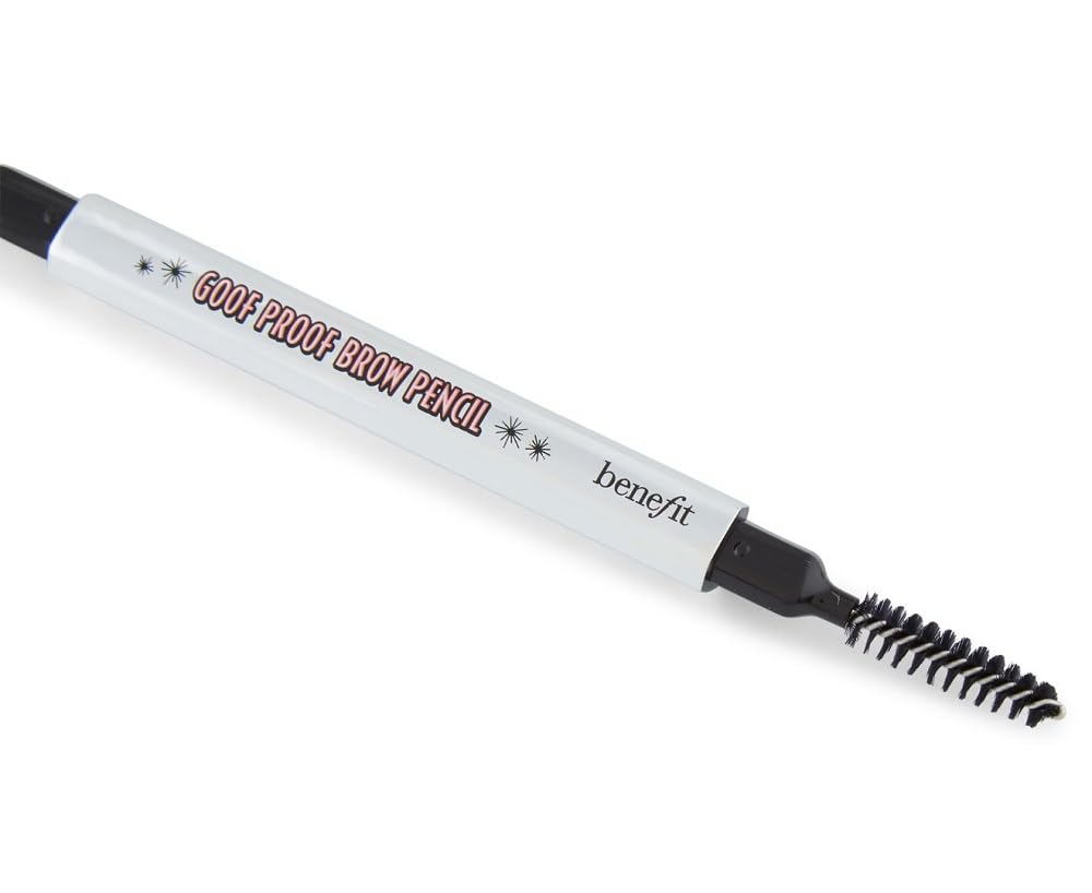 Benefit Goof Proof pencil beside a coin illustrating compact size and travel-friendly convenience