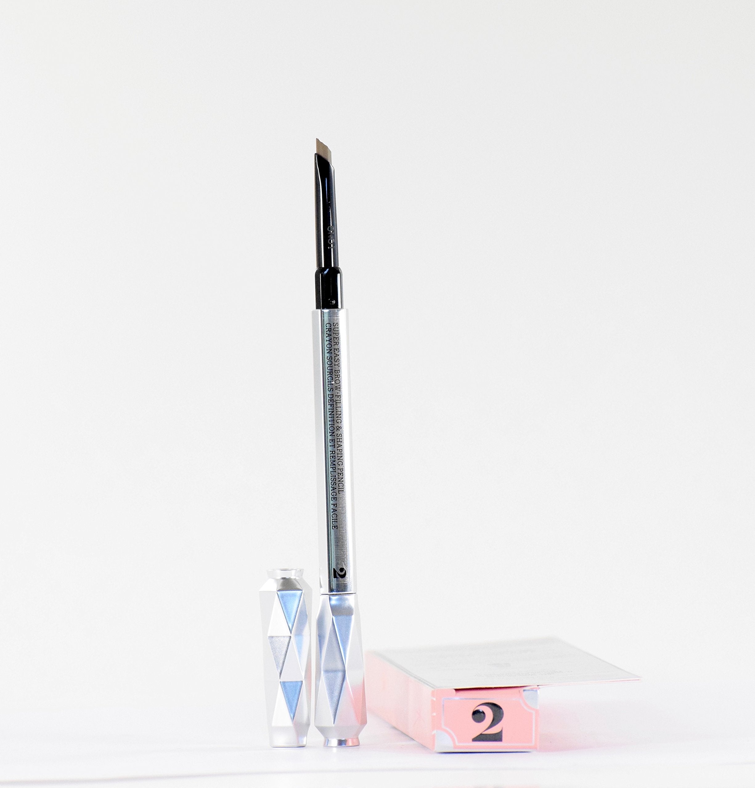 Benefit triangular tip close-up showing precise strokes and smooth application