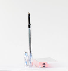 Benefit triangular tip close-up showing precise strokes and smooth application